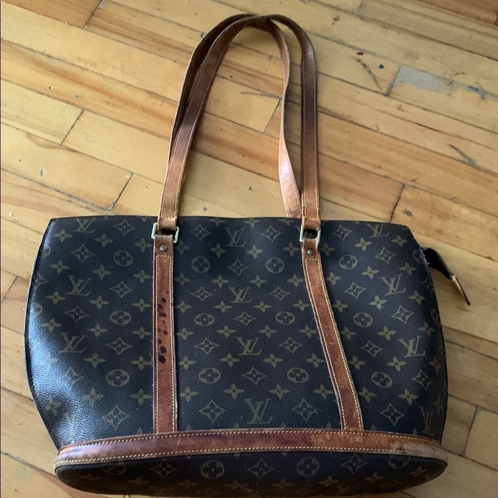 Louis Vuitton authentic Babylone Monogram Tote with Gold Hardware